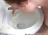 Horny redhead deepthroats and eats hot cum in a filthy toilet.