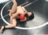 Babe with a red mask fucks her Asian opponent in the ring
