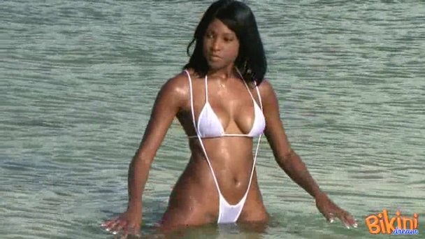 Hot ebony chick soaks her pussy wet while in white bikini. - Porn Video at  XXX Dessert Tube