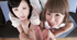 Two cute Japanese girls in lovely blouses give handjob in four hands