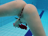 Nude underwater teen showing sexy tight pussy