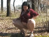 Chubby slut takes a pee in park and shows her large tits to the cam
